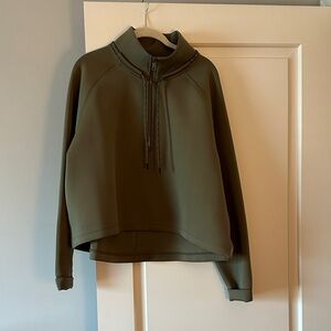 Olive Green Women's 1/2 zip. Little longer in the back. Never worn